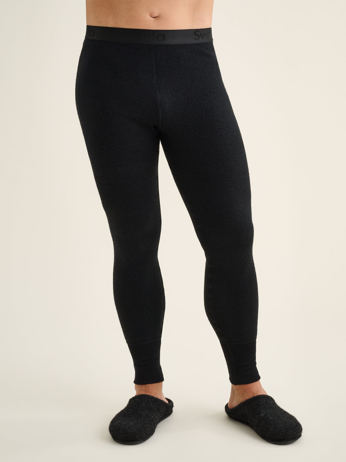 Nordic Terry Wool 400 - Midlayerhose für Herren, schwarz, Vorderansicht. Das Model ist 176 cm groß und trägt Größe M.